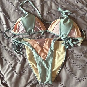 Blue two piece bikini, brand is Stylish swimwear, size large